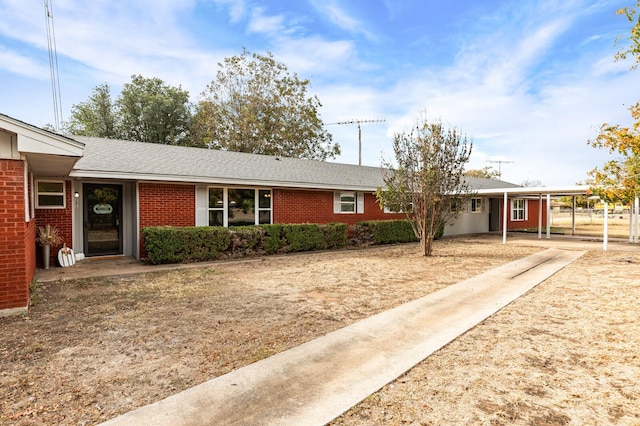 281 Lakeside Dr, China Spring, TX 76633 - ranch-style house featuring brick siding, a carport, and driveway