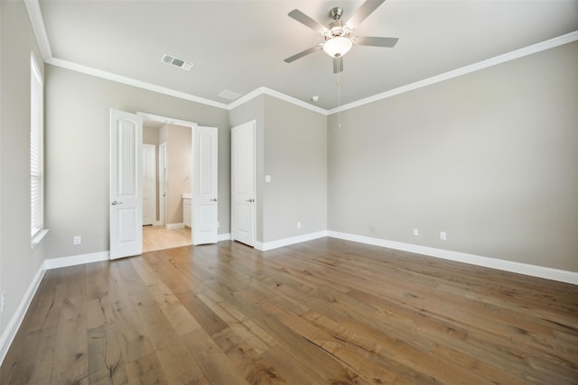 2608 Morning Mist Ln, Nevada, TX 75173 - spare room featuring ceiling fan, hardwood / wood-style floors, baseboards, and crown molding