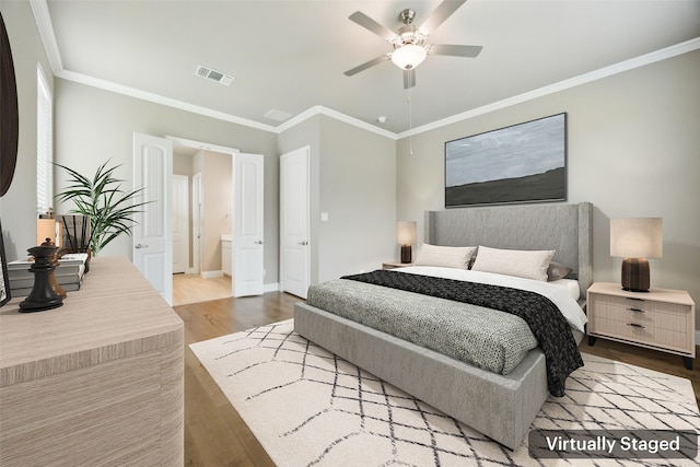 2608 Morning Mist Ln, Nevada, TX 75173 - bedroom with wood finished floors, crown molding, ceiling fan, and baseboards