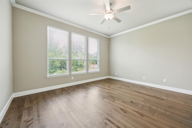 2608 Morning Mist Ln, Nevada, TX 75173 - empty room with baseboards, a ceiling fan, wood finished floors, and crown molding