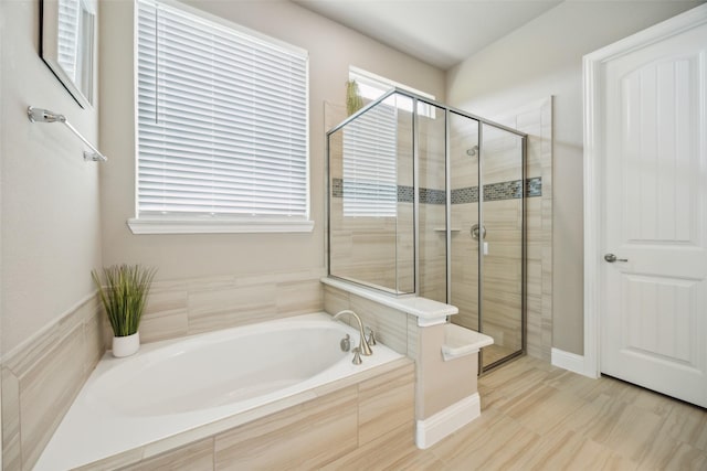 2608 Morning Mist Ln, Nevada, TX 75173 - full bathroom featuring a bath and a stall shower