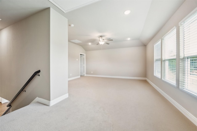 2608 Morning Mist Ln, Nevada, TX 75173 - spare room featuring attic access, light carpet, baseboards, vaulted ceiling, and a ceiling fan