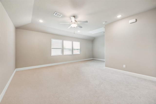 2608 Morning Mist Ln, Nevada, TX 75173 - empty room with a ceiling fan, recessed lighting, light colored carpet, baseboards, and lofted ceiling