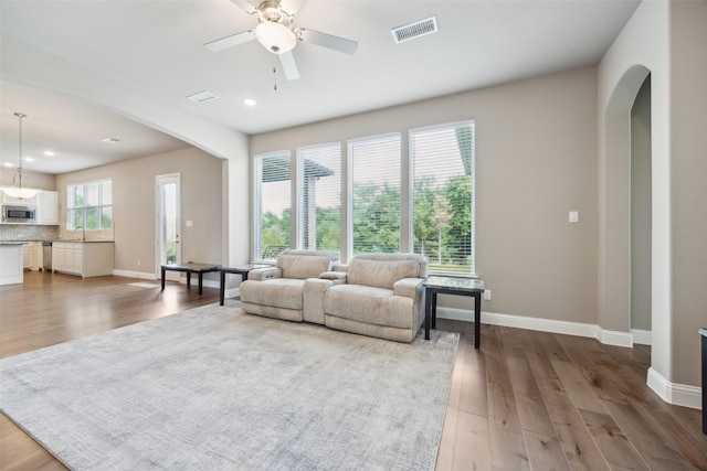 2608 Morning Mist Ln, Nevada, TX 75173 - living room with wood finished floors, baseboards, and recessed lighting