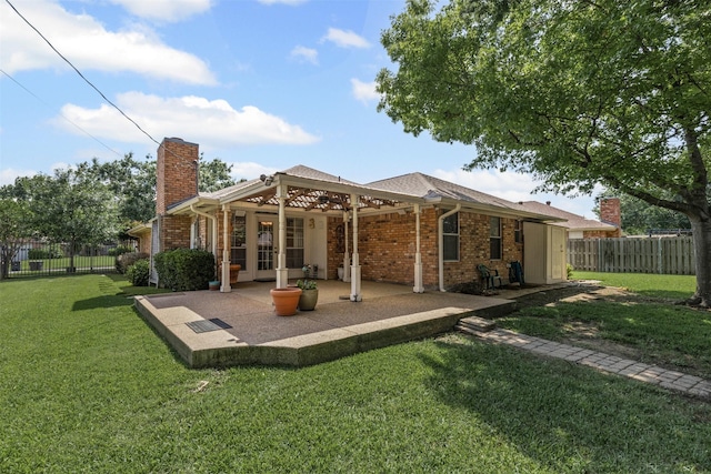 1505 Hyde Park Blvd, Cleburne, TX 76033 - rear view of house featuring a chimney, a patio area, and brick siding