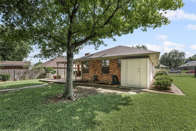 1505 Hyde Park Blvd, Cleburne, TX 76033 - back of house with brick siding and roof with shingles