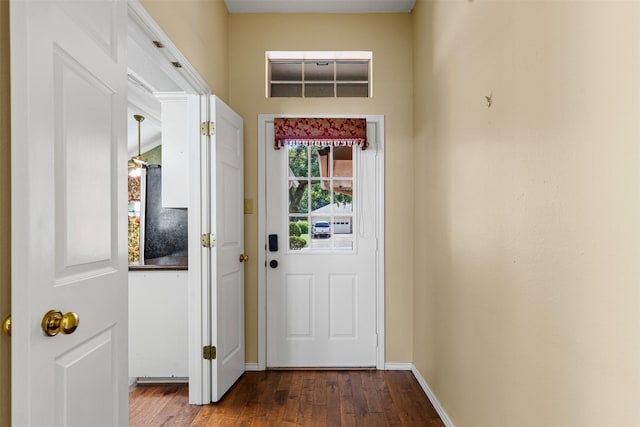 1505 Hyde Park Blvd, Cleburne, TX 76033 - entryway with dark wood-style flooring and baseboards