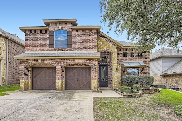 9028 Wiggins Dr, Fort Worth, TX 76244 - view of front of home with an attached garage, brick siding, concrete driveway, and a shingled roof