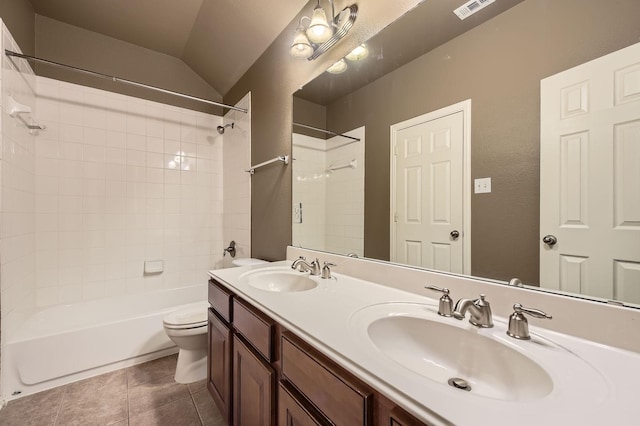 9028 Wiggins Dr, Fort Worth, TX 76244 - full bath with toilet, double vanity,  shower combination, tile patterned floors, and lofted ceiling