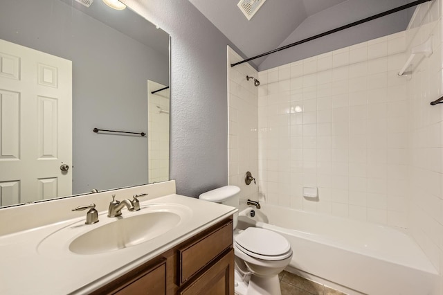 9028 Wiggins Dr, Fort Worth, TX 76244 - full bathroom featuring toilet, vanity, bathing tub / shower combination, a textured wall, and lofted ceiling