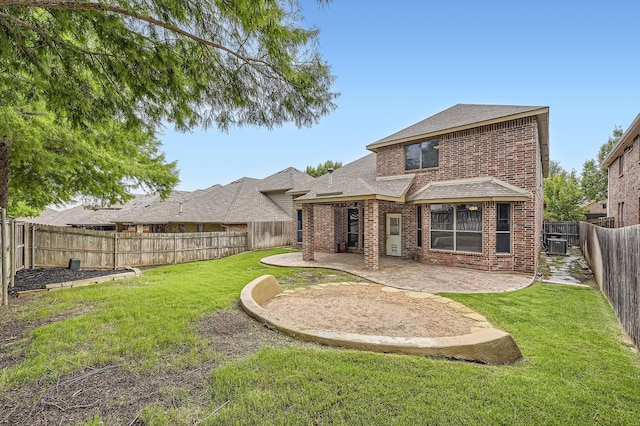 9028 Wiggins Dr, Fort Worth, TX 76244 - rear view of house with brick siding, a patio, a shingled roof, and central AC