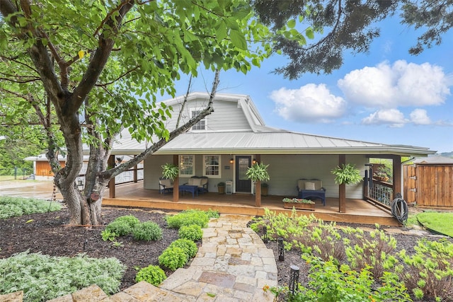 4009 Seminole Trl, Granbury, TX 76048 - country-style home with metal roof and covered porch