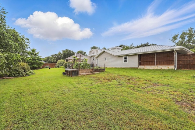 4009 Seminole Trl, Granbury, TX 76048 - view of yard featuring a vegetable garden and a sunroom