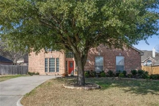 14 E Hillside Pl, Trophy Club, TX 76262 - obstructed view of property featuring driveway