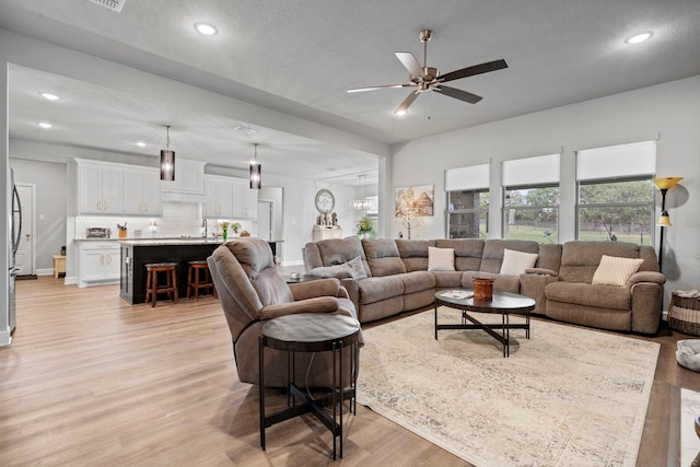105 Aslan Rd, Poolville, TX 76487 - living room with light wood-style flooring, recessed lighting, a ceiling fan, and baseboards