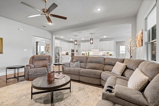 105 Aslan Rd, Poolville, TX 76487 - living area with wood finished floors, recessed lighting, a ceiling fan, and baseboards