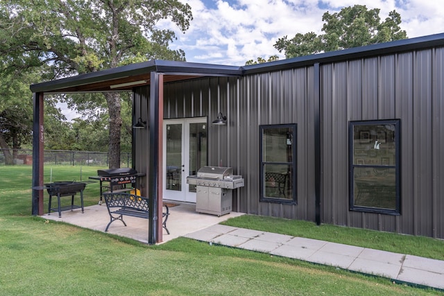 105 Aslan Rd, Poolville, TX 76487 - view of patio with grilling area and french doors