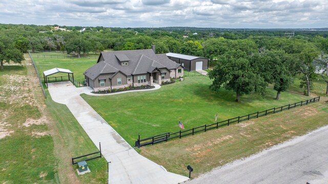 105 Aslan Rd, Poolville, TX 76487 - aerial view of property and surrounding area with a heavily wooded area