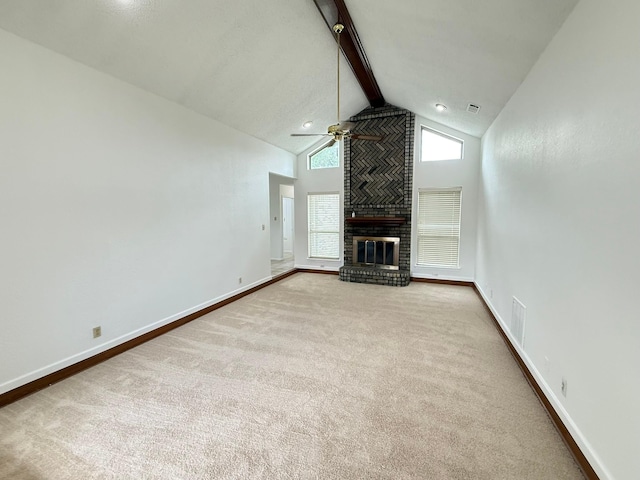 617 Desoto Dr, Desoto, TX 75115 - unfurnished living room with high vaulted ceiling, ceiling fan, carpet floors, a brick fireplace, and beamed ceiling