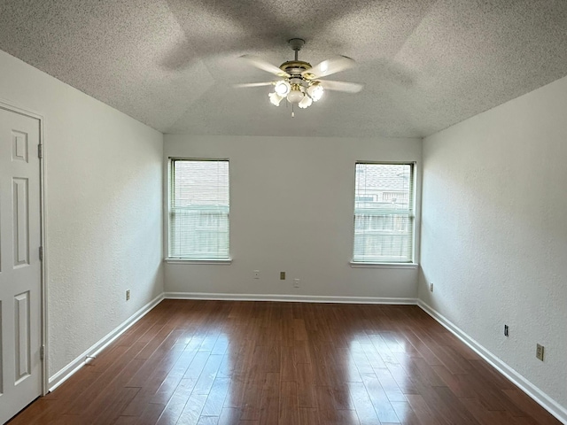 617 Desoto Dr, Desoto, TX 75115 - empty room featuring a textured ceiling, a ceiling fan, wood finished floors, a textured wall, and baseboards