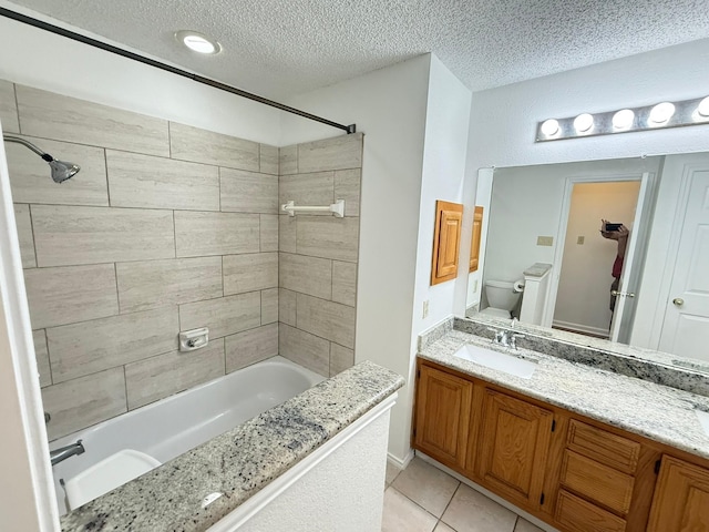 617 Desoto Dr, Desoto, TX 75115 - bathroom featuring  shower combination, a textured ceiling, toilet, tile patterned flooring, and vanity