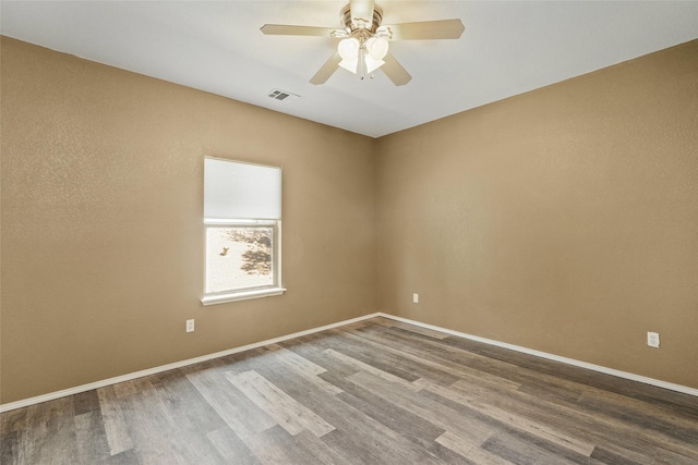 3116 Frazier Ave, Fort Worth, TX 76110 - empty room featuring wood finished floors, ceiling fan, and baseboards