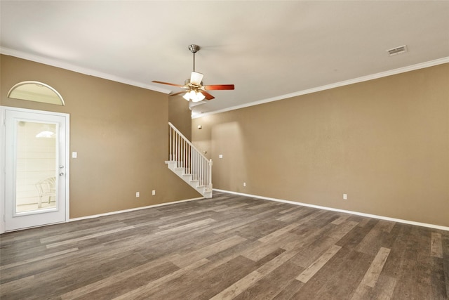 3116 Frazier Ave, Fort Worth, TX 76110 - empty room with stairway, ceiling fan, wood finished floors, crown molding, and baseboards