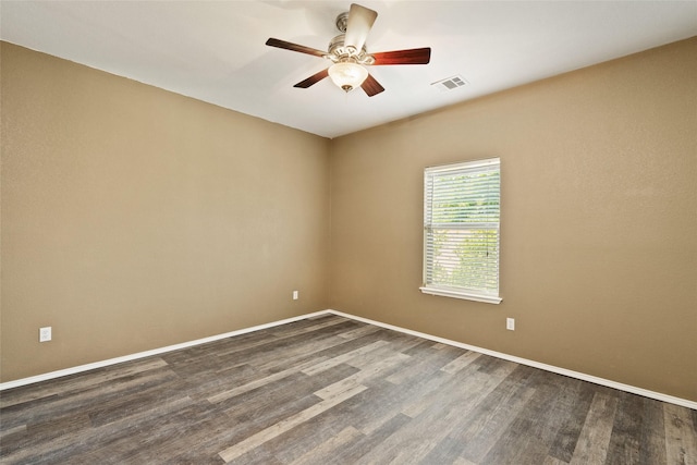 3116 Frazier Ave, Fort Worth, TX 76110 - spare room with dark wood finished floors, a ceiling fan, and baseboards