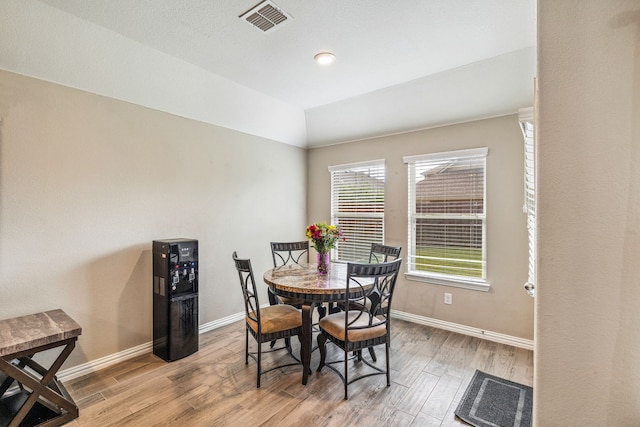 404 Madrone Ln, Princeton, TX 75407 - dining area with wood finished floors, baseboards, and lofted ceiling