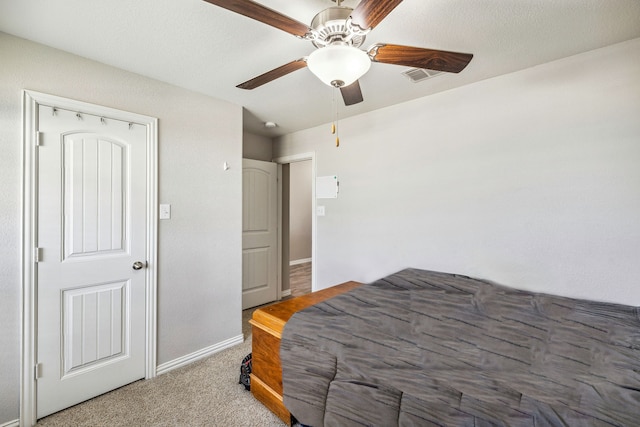 404 Madrone Ln, Princeton, TX 75407 - bedroom with baseboards, carpet floors, and a ceiling fan