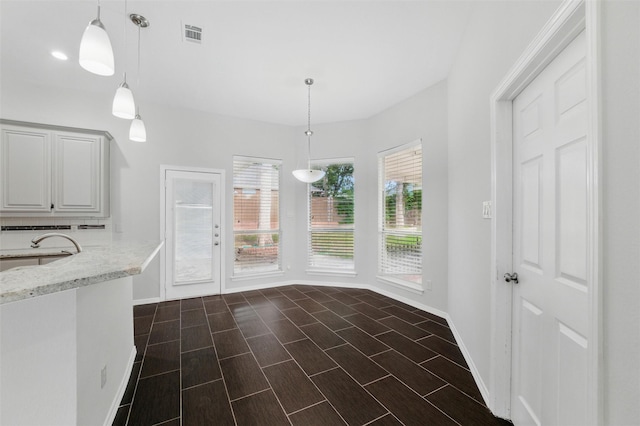 3402 Blue Forest Dr, Arlington, TX 76001 - unfurnished dining area with baseboards