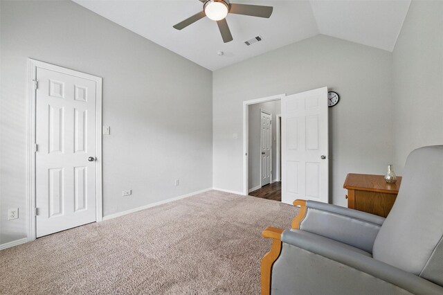 3402 Blue Forest Dr, Arlington, TX 76001 - living area with vaulted ceiling, ceiling fan, dark carpet, and baseboards