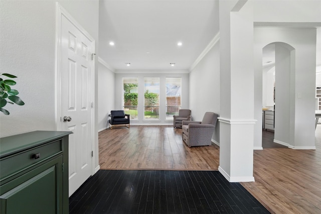 3402 Blue Forest Dr, Arlington, TX 76001 - entrance foyer featuring arched walkways, dark wood-style floors, ornamental molding, baseboards, and recessed lighting
