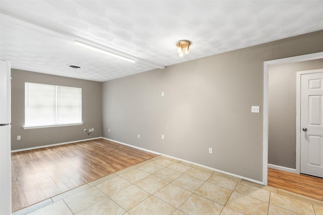 2363 Talco Dr, Dallas, TX 75241 - empty room with light tile patterned floors and baseboards