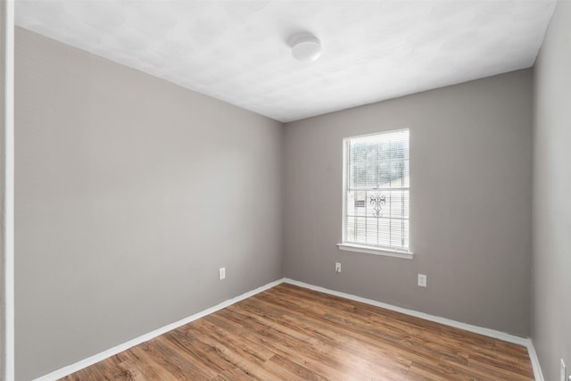2363 Talco Dr, Dallas, TX 75241 - empty room with wood finished floors and baseboards