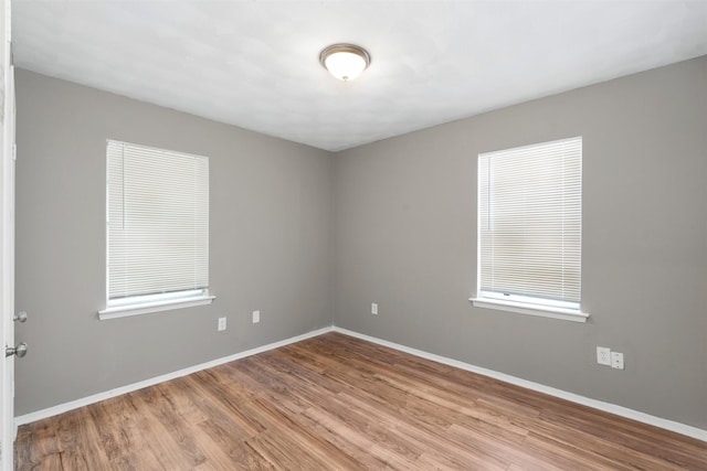 2363 Talco Dr, Dallas, TX 75241 - unfurnished room featuring wood finished floors and baseboards