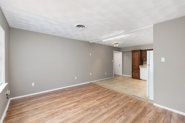 2363 Talco Dr, Dallas, TX 75241 - spare room with light wood finished floors and baseboards