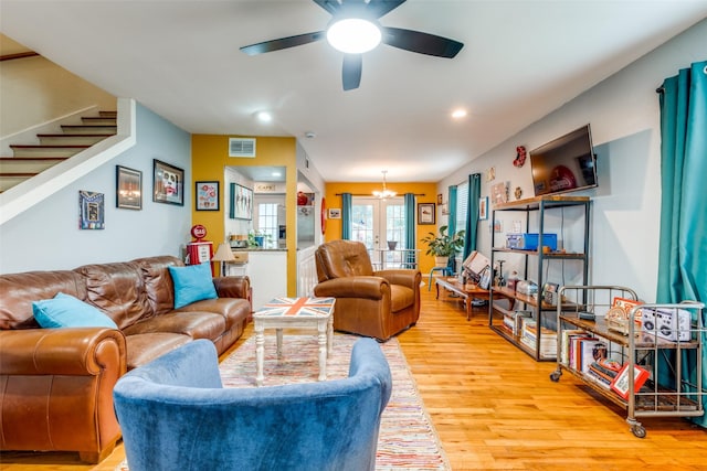 4902 N Hall St, Dallas, TX 75235 - living area featuring light wood-style flooring, a ceiling fan, stairs, and recessed lighting