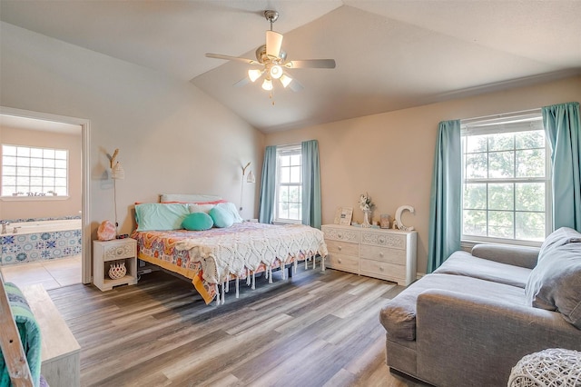 106 Camelot St, Glen Rose, TX 76043 - bedroom featuring lofted ceiling, wood finished floors, ceiling fan, and ensuite bathroom