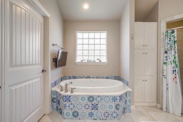 106 Camelot St, Glen Rose, TX 76043 - bathroom with a bath, tile patterned flooring, and a shower with shower curtain