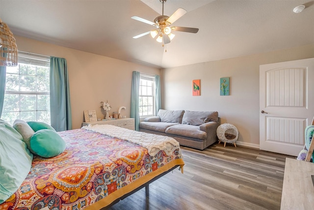 106 Camelot St, Glen Rose, TX 76043 - bedroom with wood finished floors and a ceiling fan