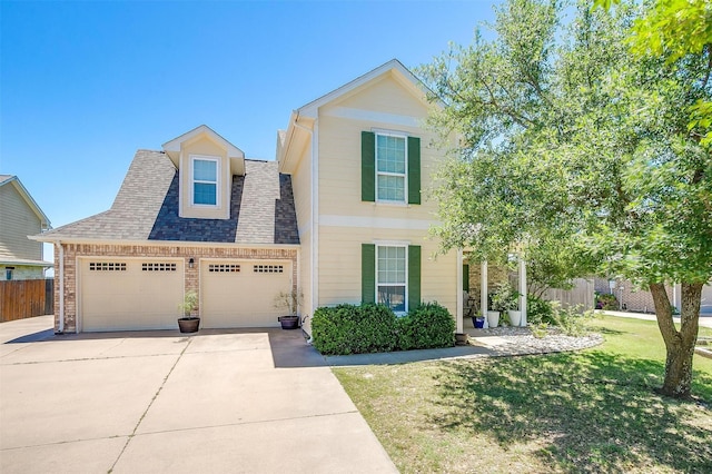 106 Camelot St, Glen Rose, TX 76043 - view of front of house featuring an attached garage, concrete driveway, and a shingled roof