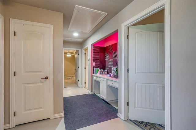 106 Camelot St, Glen Rose, TX 76043 - corridor featuring attic access and recessed lighting