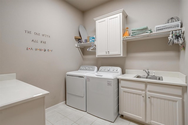 106 Camelot St, Glen Rose, TX 76043 - laundry room with independent washer and dryer, cabinet space, and light tile patterned floors