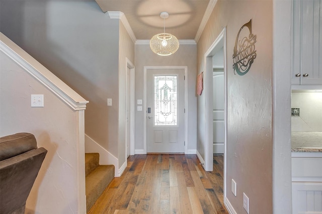 106 Camelot St, Glen Rose, TX 76043 - entryway with stairway, light wood-type flooring, and ornamental molding