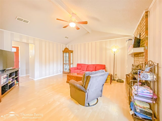 2850 Button Willow Ave, Abilene, TX 79606 - living area with light wood finished floors, wallpapered walls, and a ceiling fan