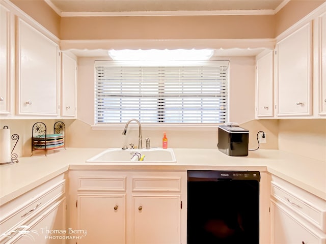 2850 Button Willow Ave, Abilene, TX 79606 - kitchen with dishwasher, a sink, light countertops, white cabinetry, and crown molding
