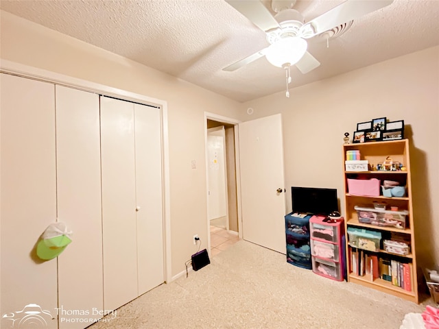 2850 Button Willow Ave, Abilene, TX 79606 - game room featuring carpet, ceiling fan, and a textured ceiling