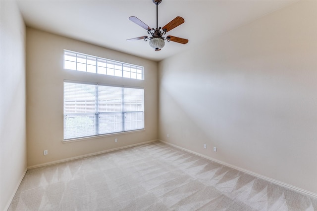 1728 Sandpiper Ln, Carrollton, TX 75007 - spare room featuring carpet flooring, plenty of natural light, baseboards, and ceiling fan