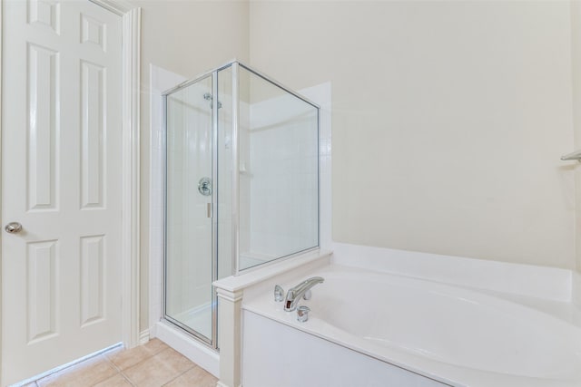 1728 Sandpiper Ln, Carrollton, TX 75007 - bathroom with a garden tub, tile patterned flooring, and a shower stall